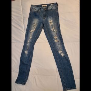 Ripped High Rise Skinny Jeans